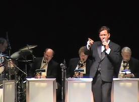 Vocalist Frank Lamphere sings with a big band
